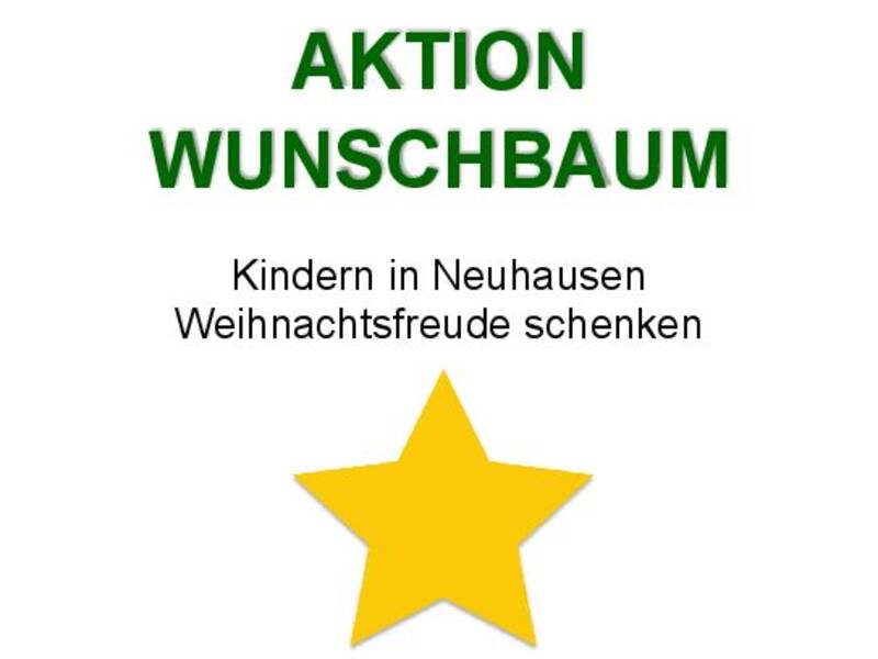 Ein Plakat mit der Aufschrift "AKTION WUNSCHBAUM – Kindern in Neuhausen Weihnachtsfreude schenken" und einem gelben Stern darunter.